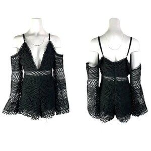 Black Crochet long sleeve romper. Size Large. From Boutique in Dallas